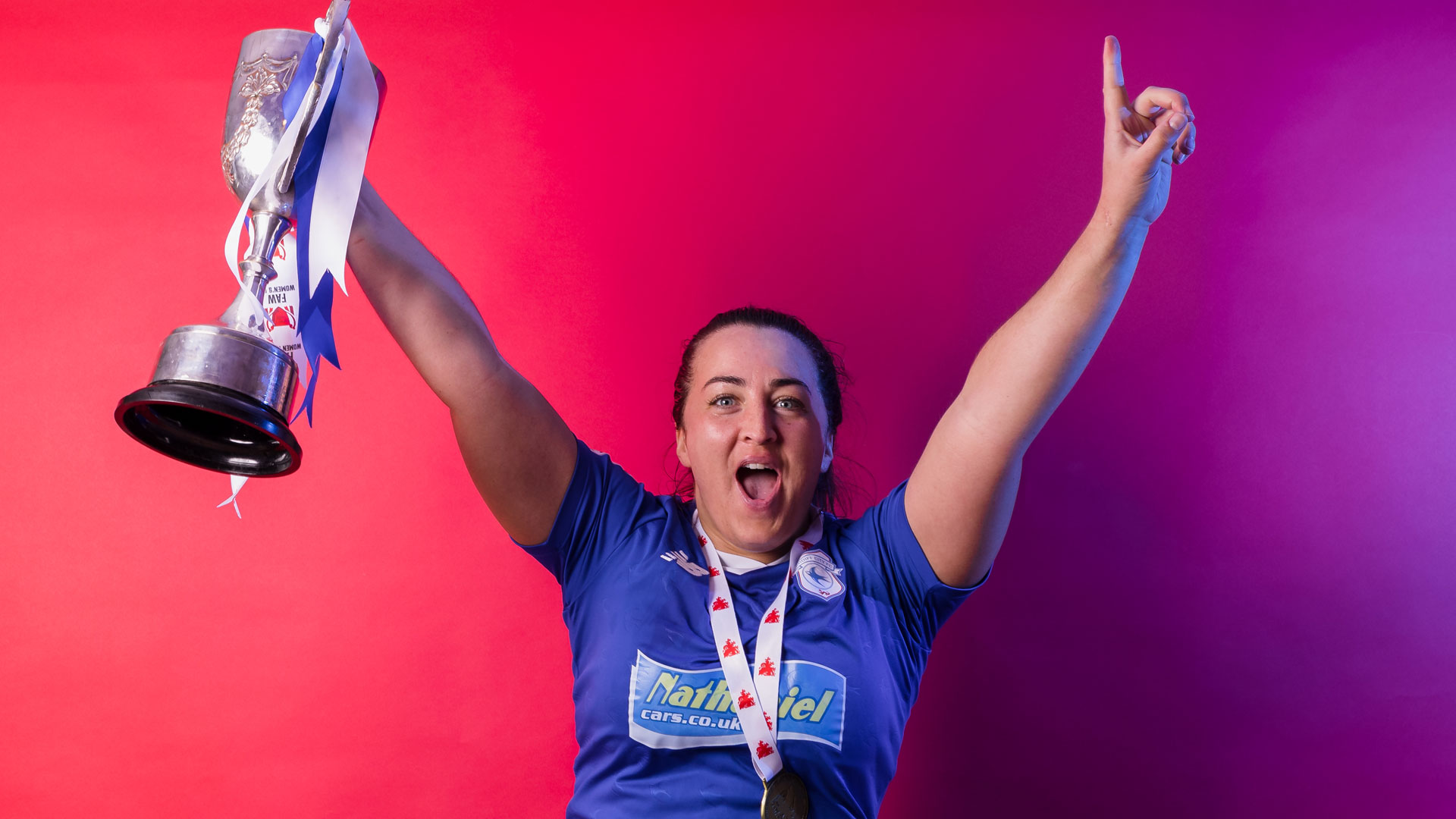 Catherine Walsh celebrates with the trophy...