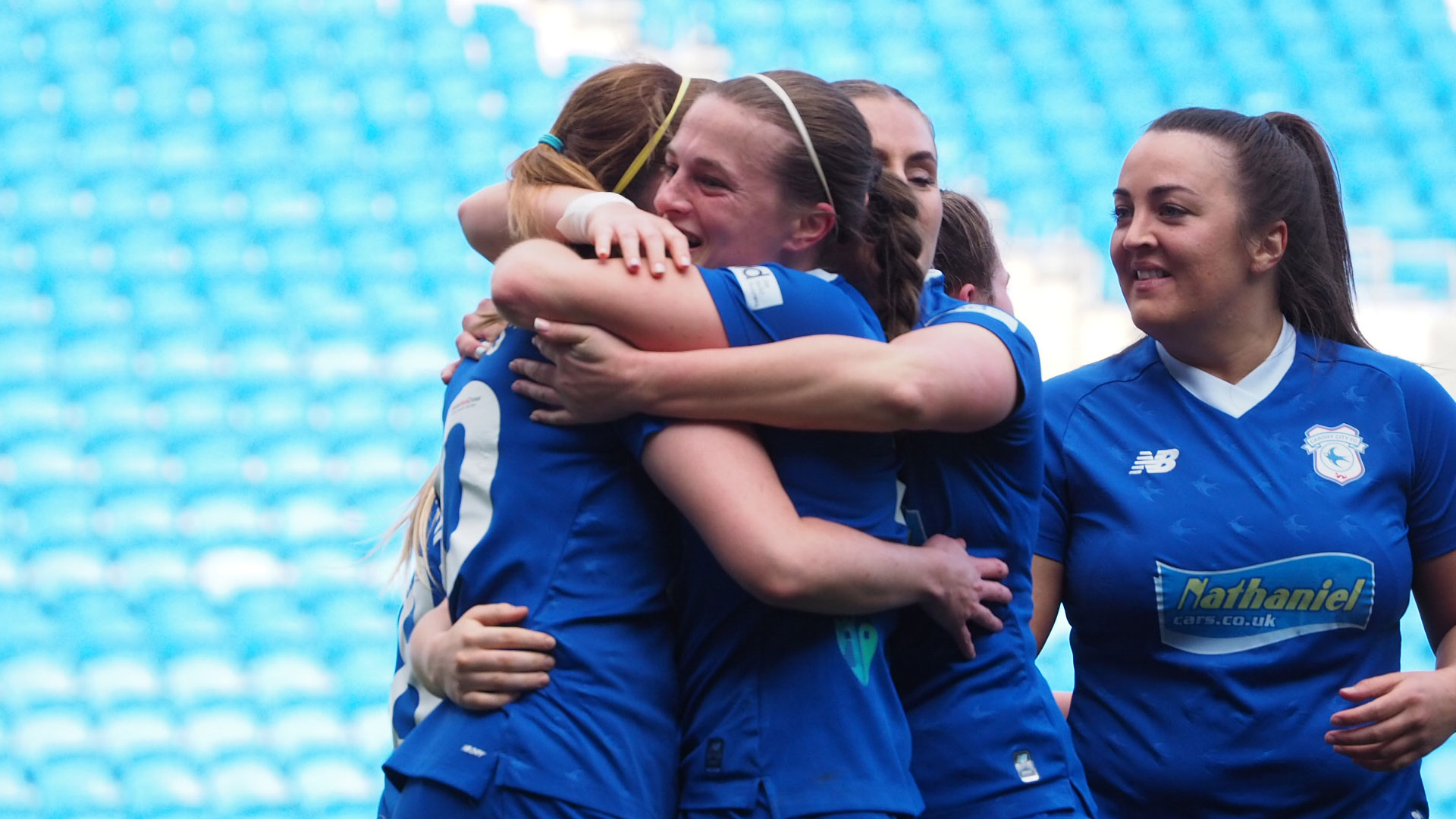 The Bluebirds celebrate their Adran Premier win...