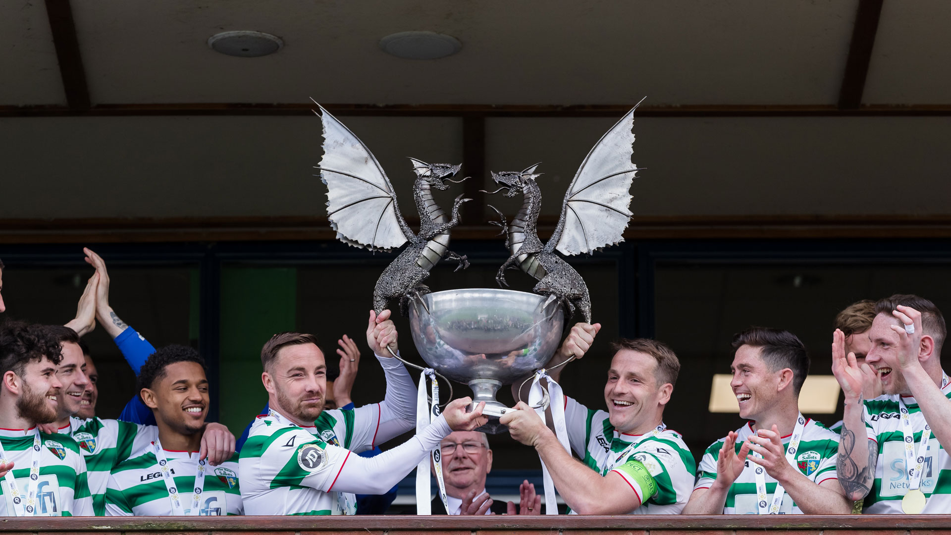 TNS celebrate after winning the title in 2023...