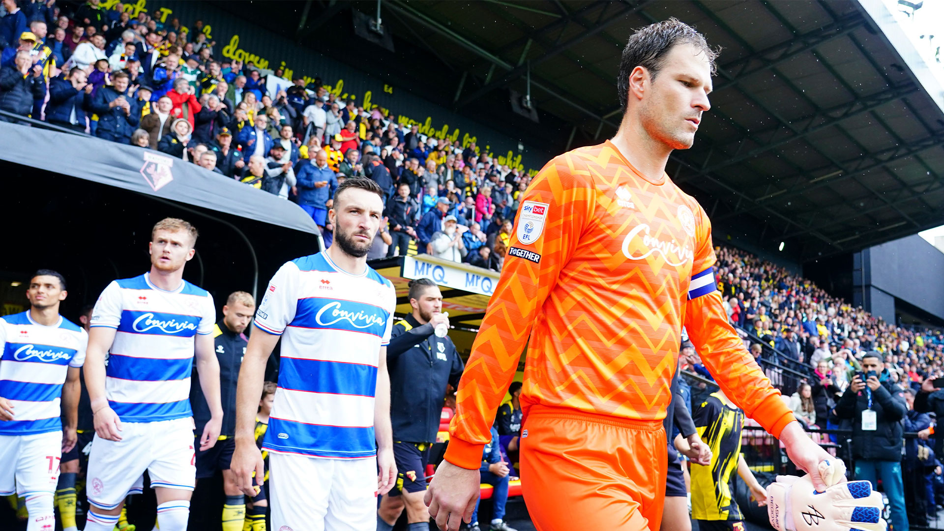 Asmir Begovic leads his team out for Queens Park Rangers' season opener against Watford