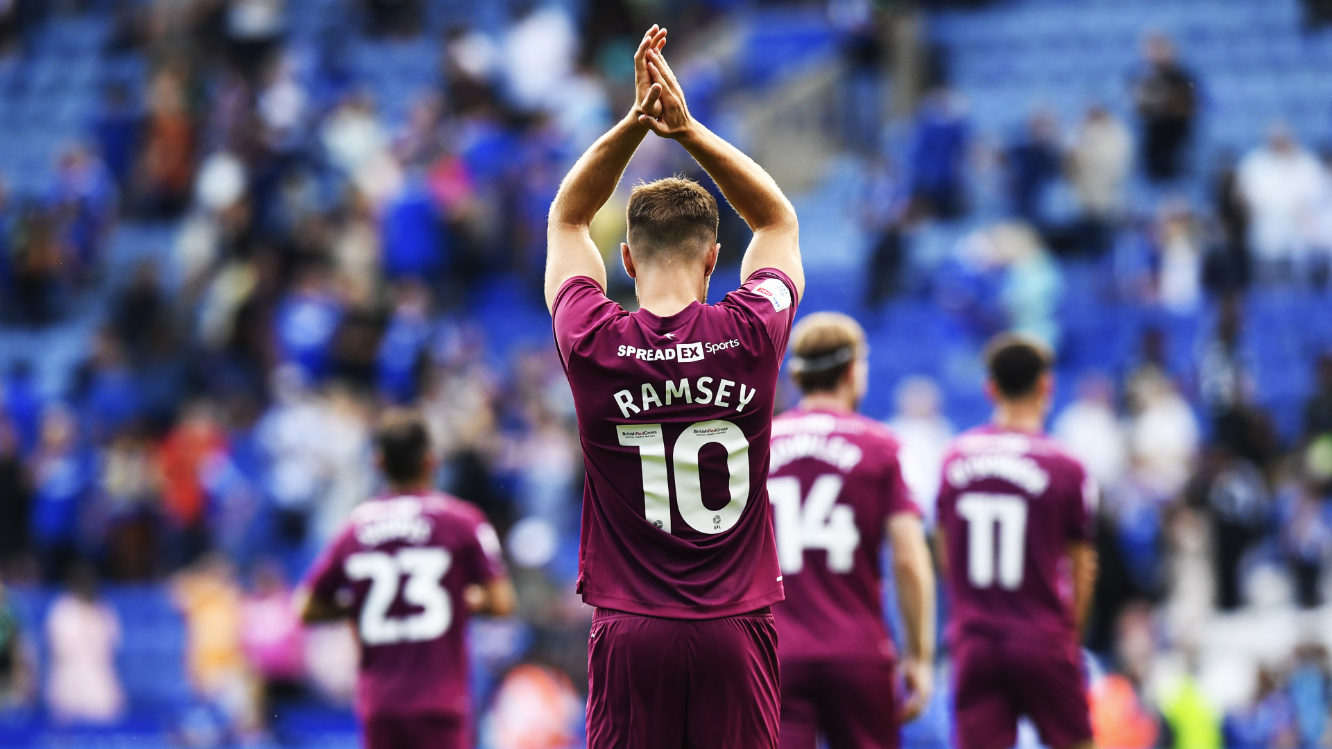 Aaron Ramsey applauds the City support...