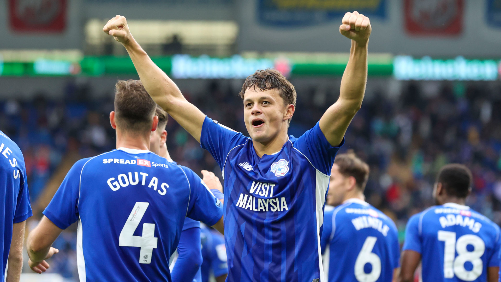 Perry Ng celebrates scoring for Cardiff City