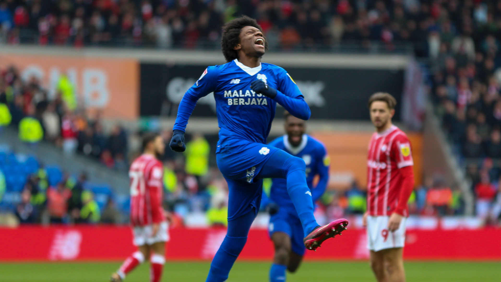 Jaden Philogene celebrates scoring for Cardiff City