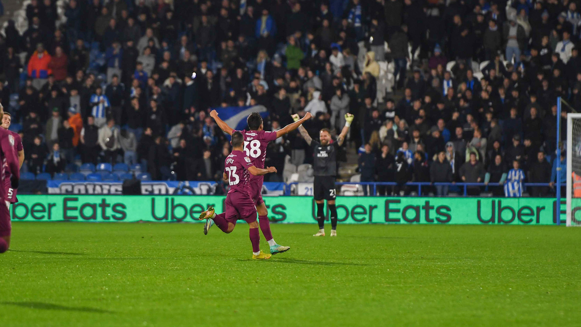 Perry Ng celebrates his stunner against Huddersfield Town...