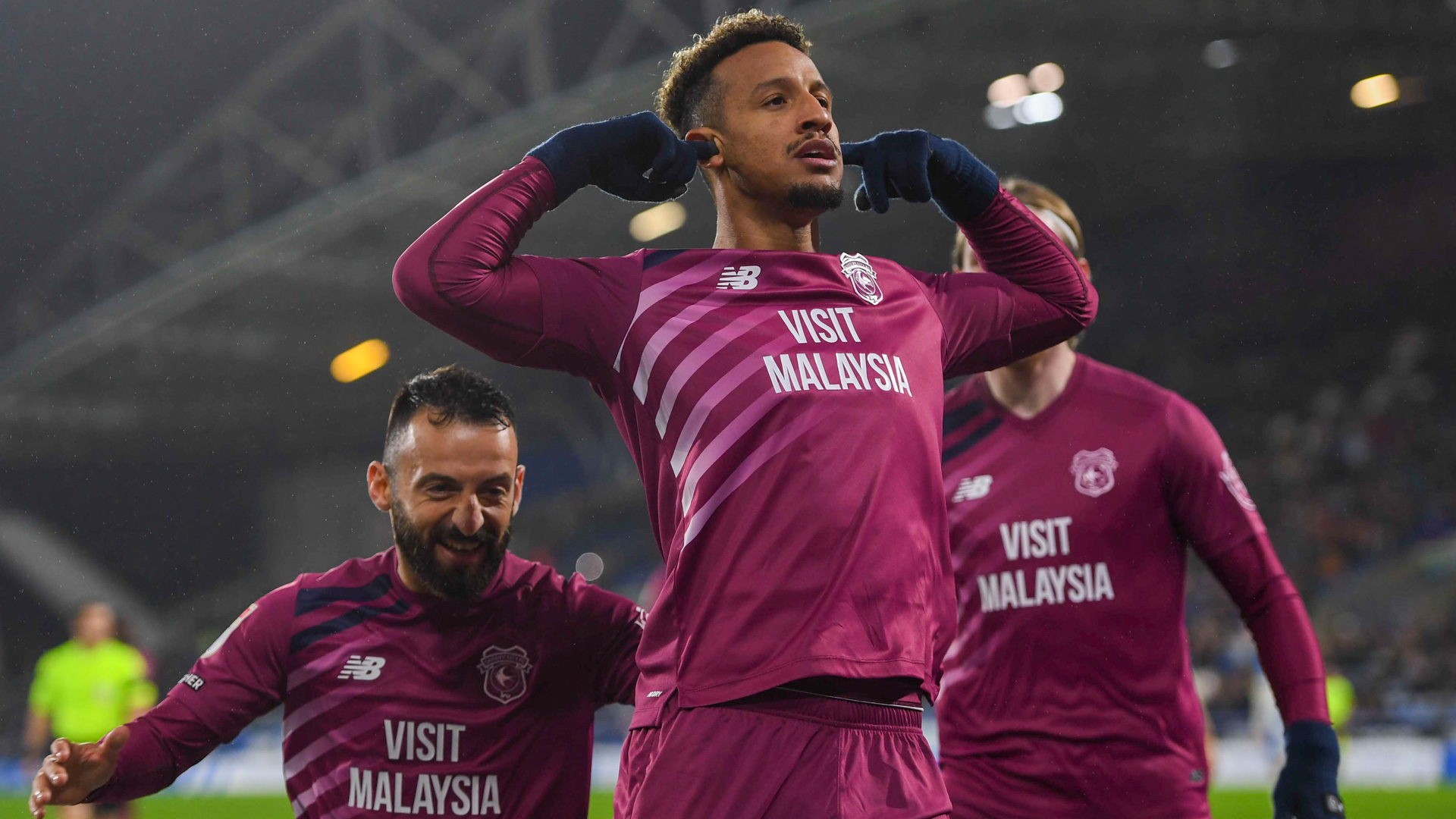 Callum Robinson celebrates at Huddersfield Town...