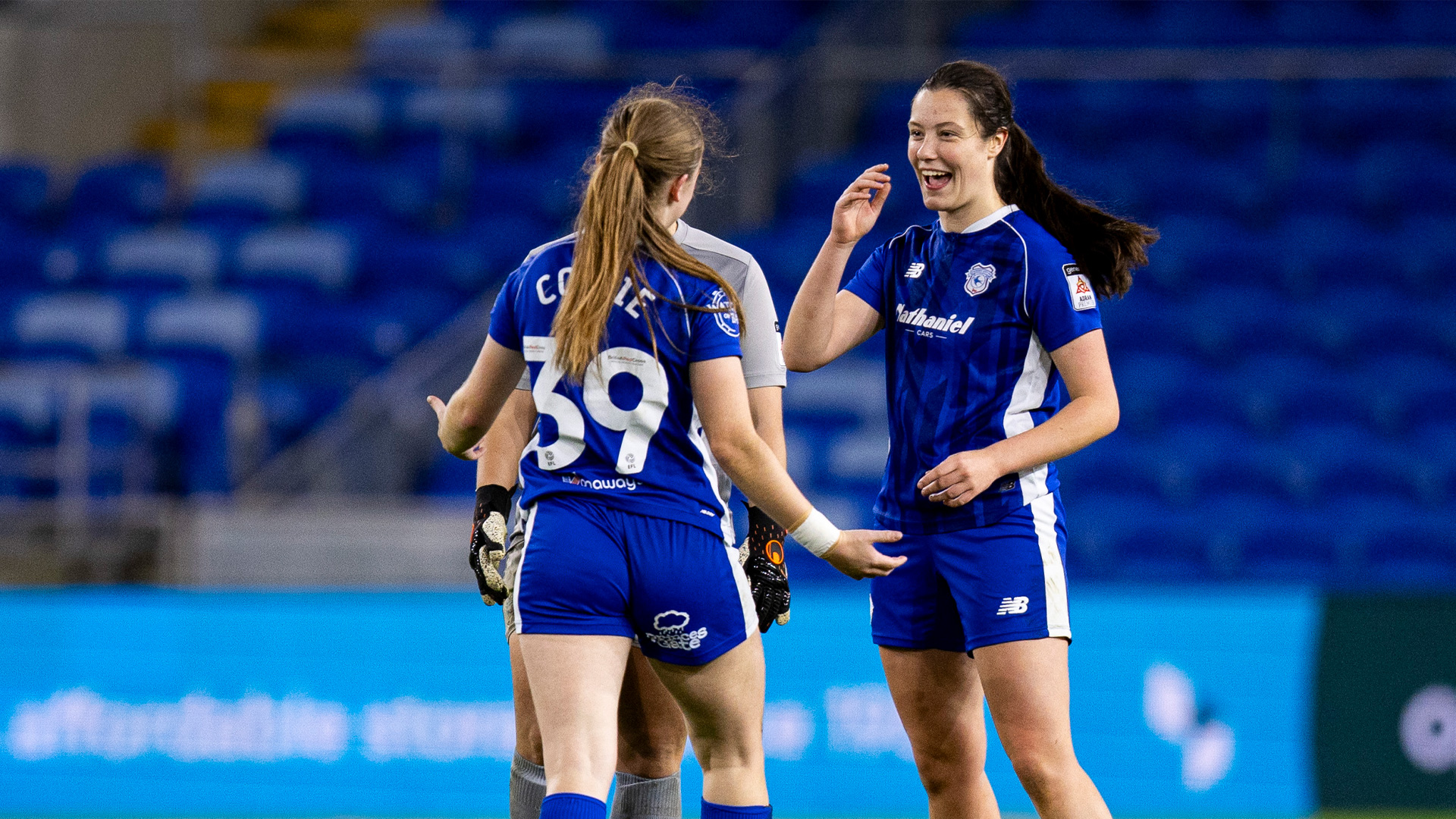 Megan Bowen celebrates with Eliza Collie