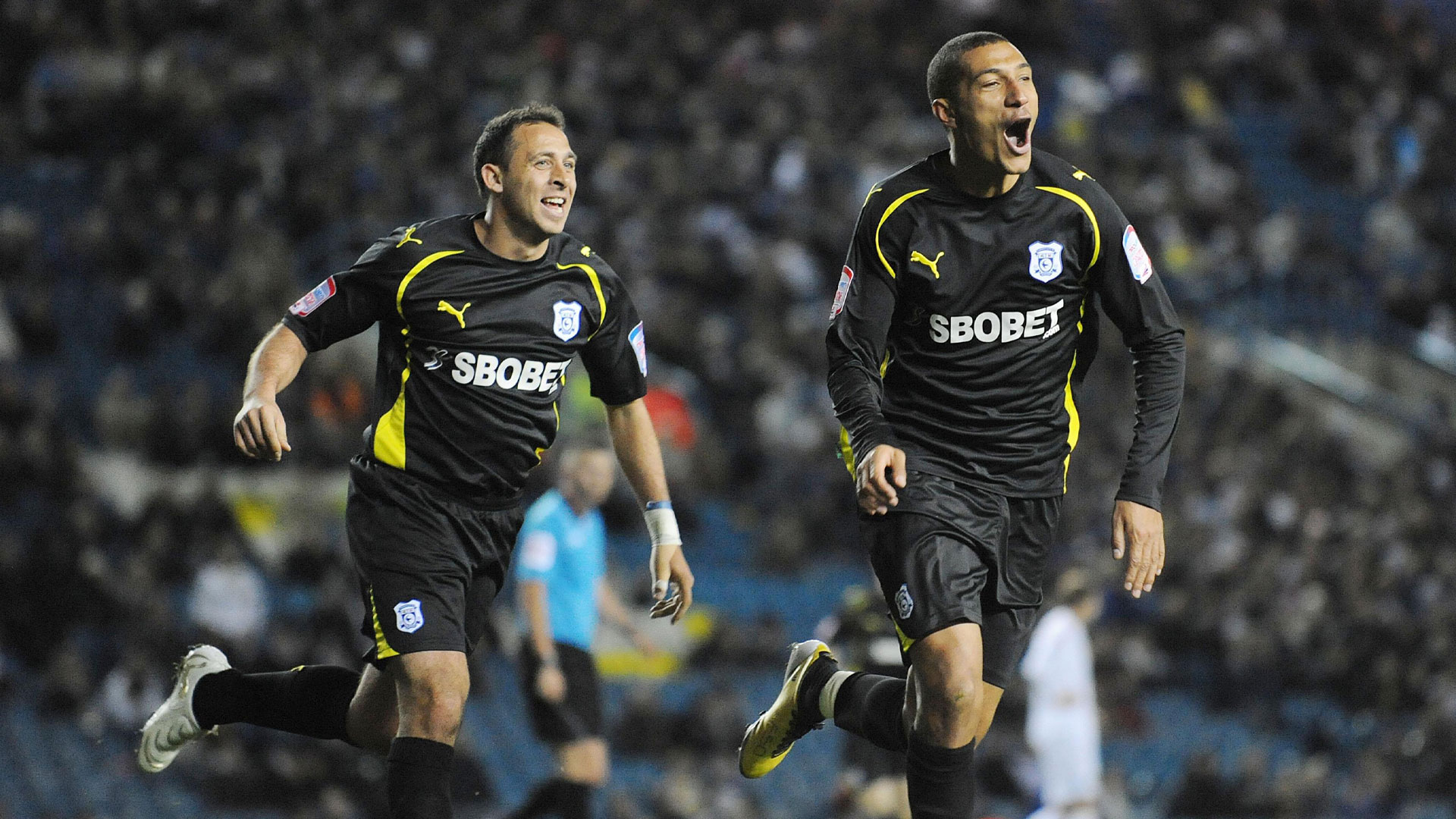 Jay Bothroyd (right) celebrates scoring for Cardiff City, alongside Michael Chopra (left)