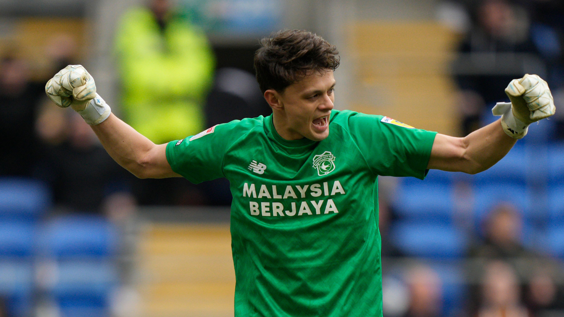 Perry Ng celebrates Cardiff City's victory over Bristol City