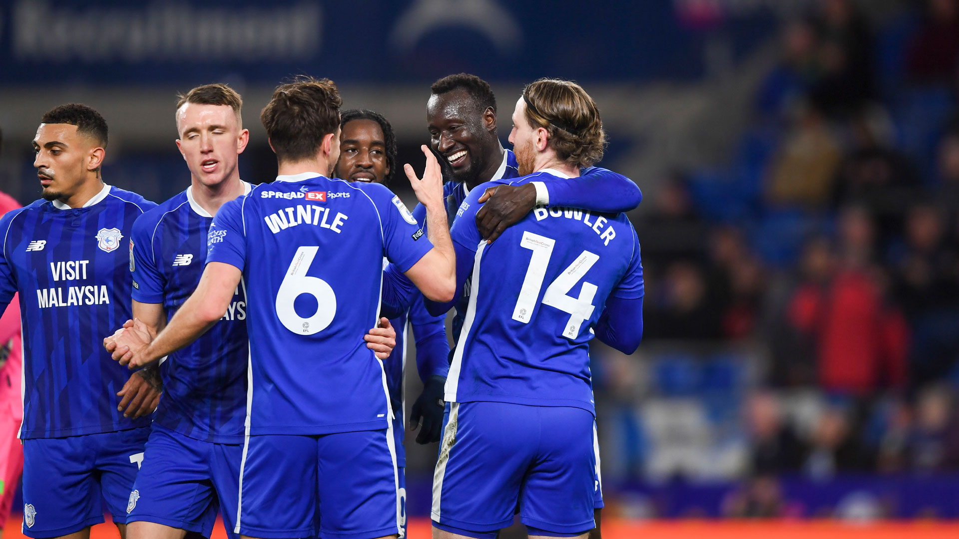 Cardiff City celebrate scoring against Huddersfield Town