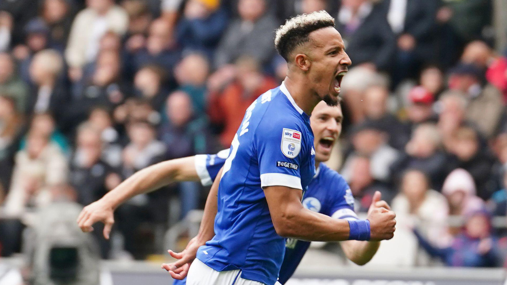 Callum Robinson and Aaron Ramsey celebrate...