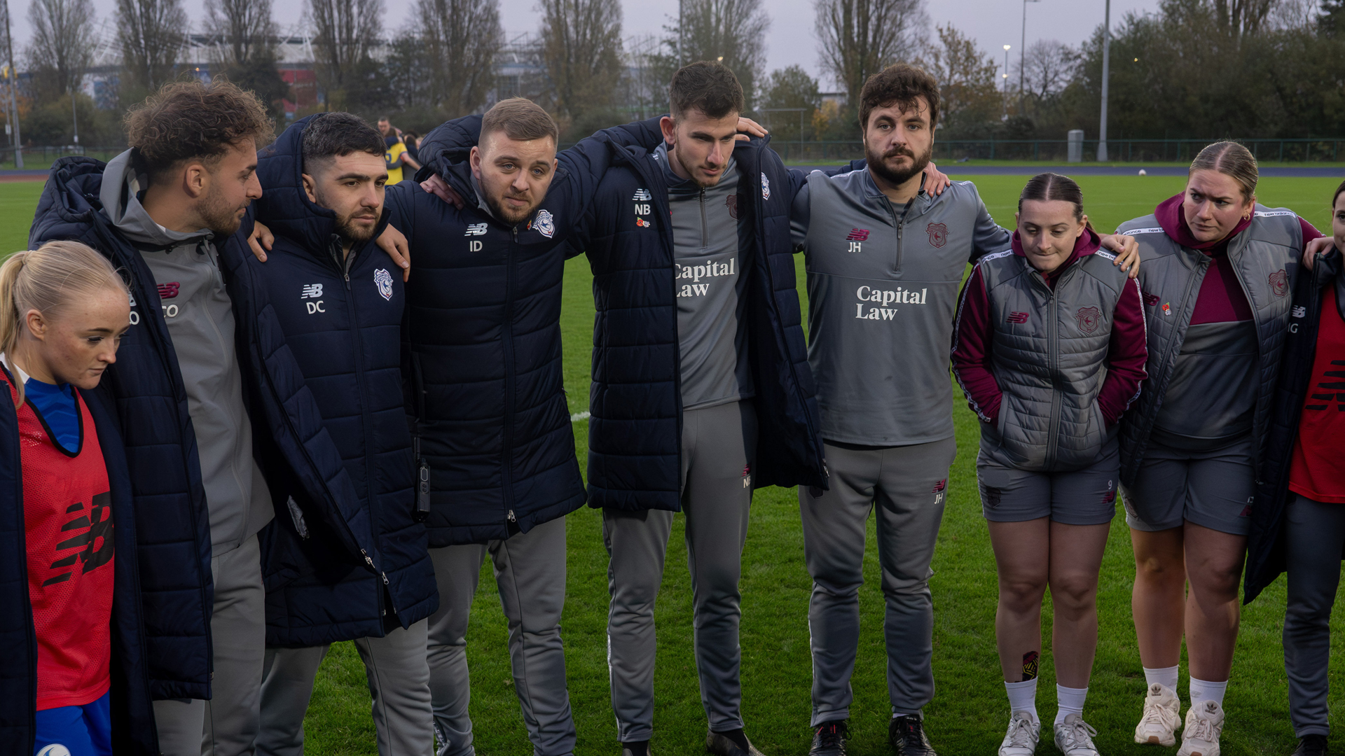 Iain Darbyshire speaks to the squad following the full-time whistle