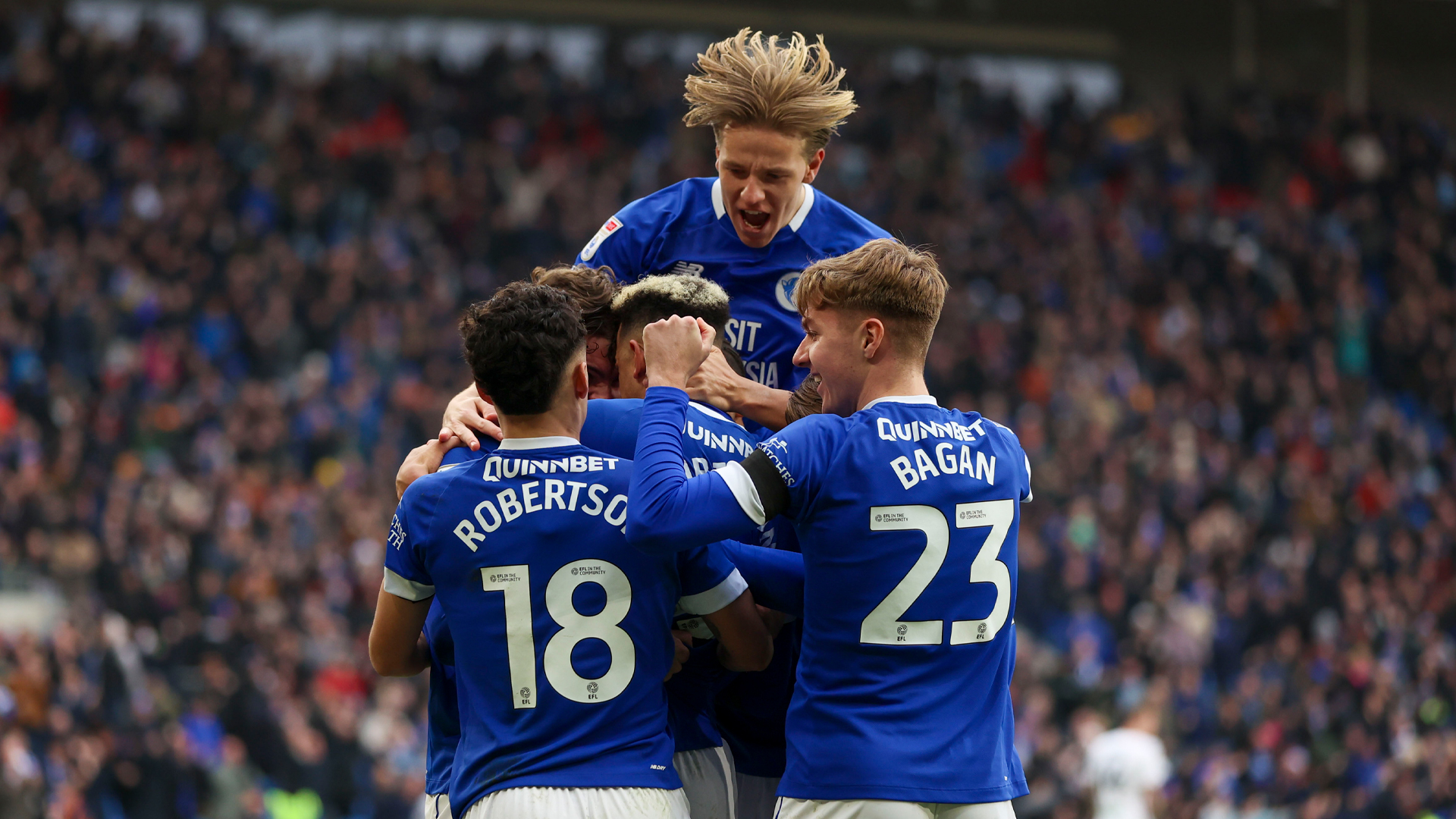 Cardiff City celebrate scoring against Swansea City