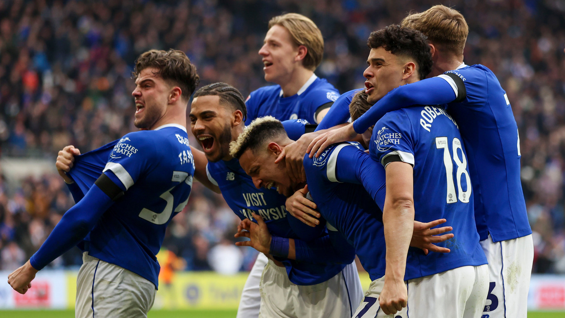 Cardiff City celebrate scoring against Swansea City