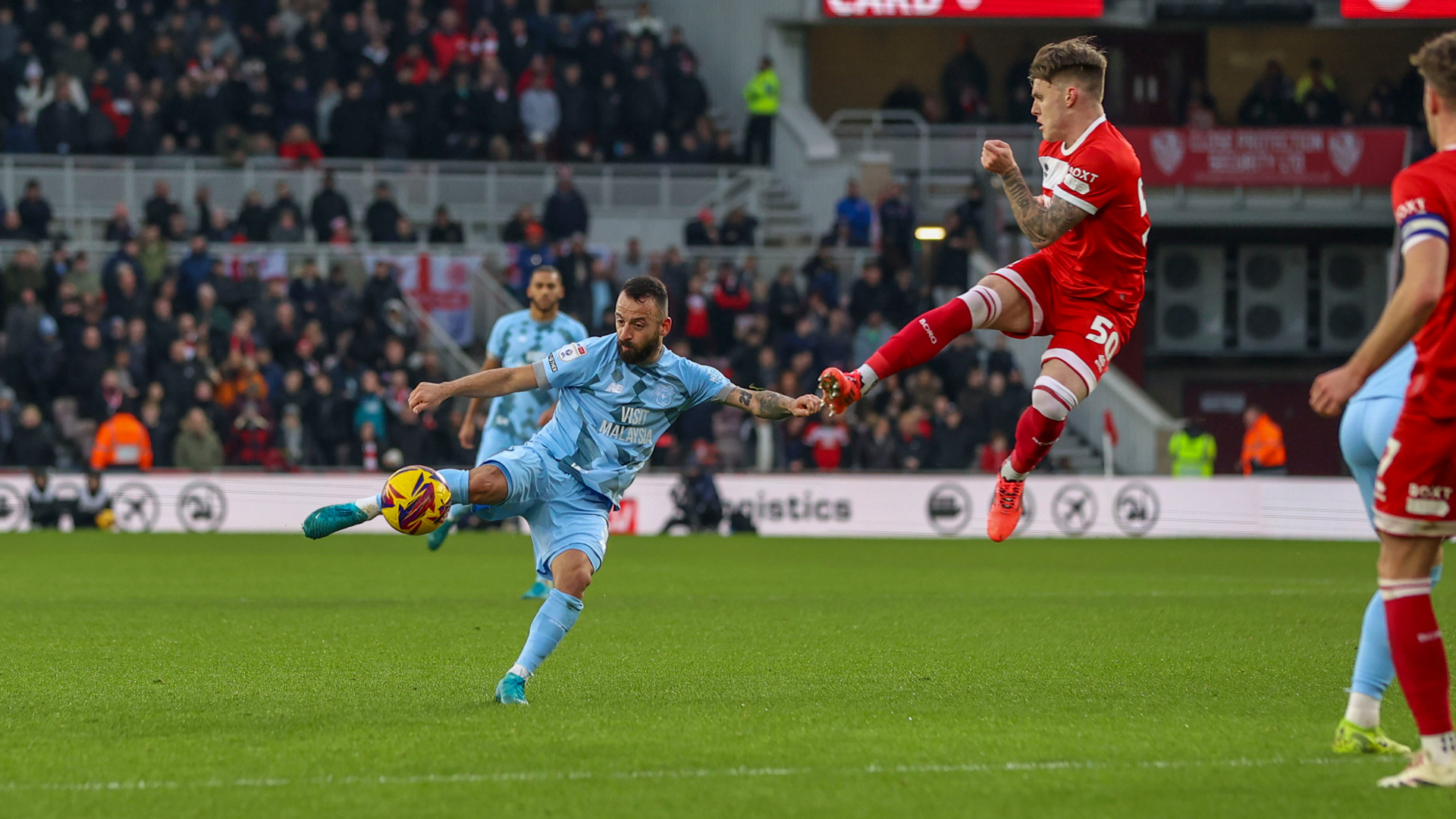 Sio strikes the ball at the Riverside...