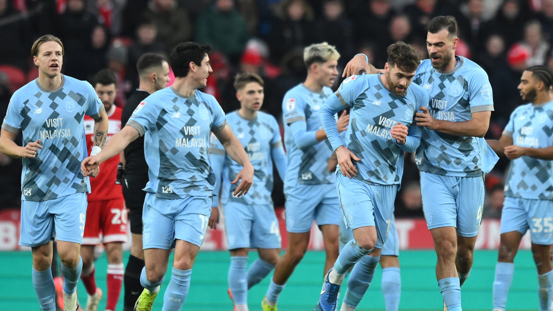 Calum Chambers celebrates his strike at the Riverside...