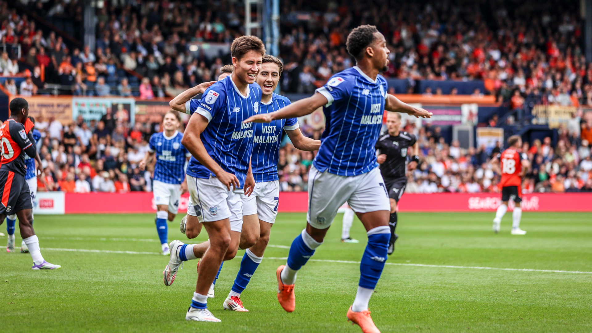 Chris Willock celebrates his goal against Luton Town...
