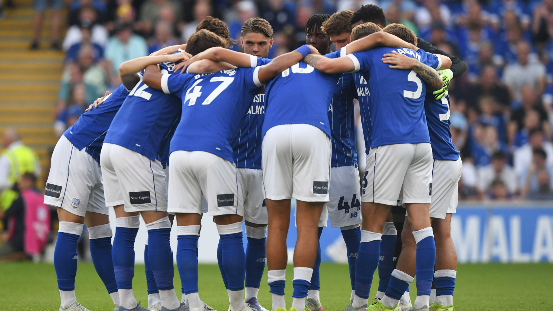 Cardiff City's squad huddle