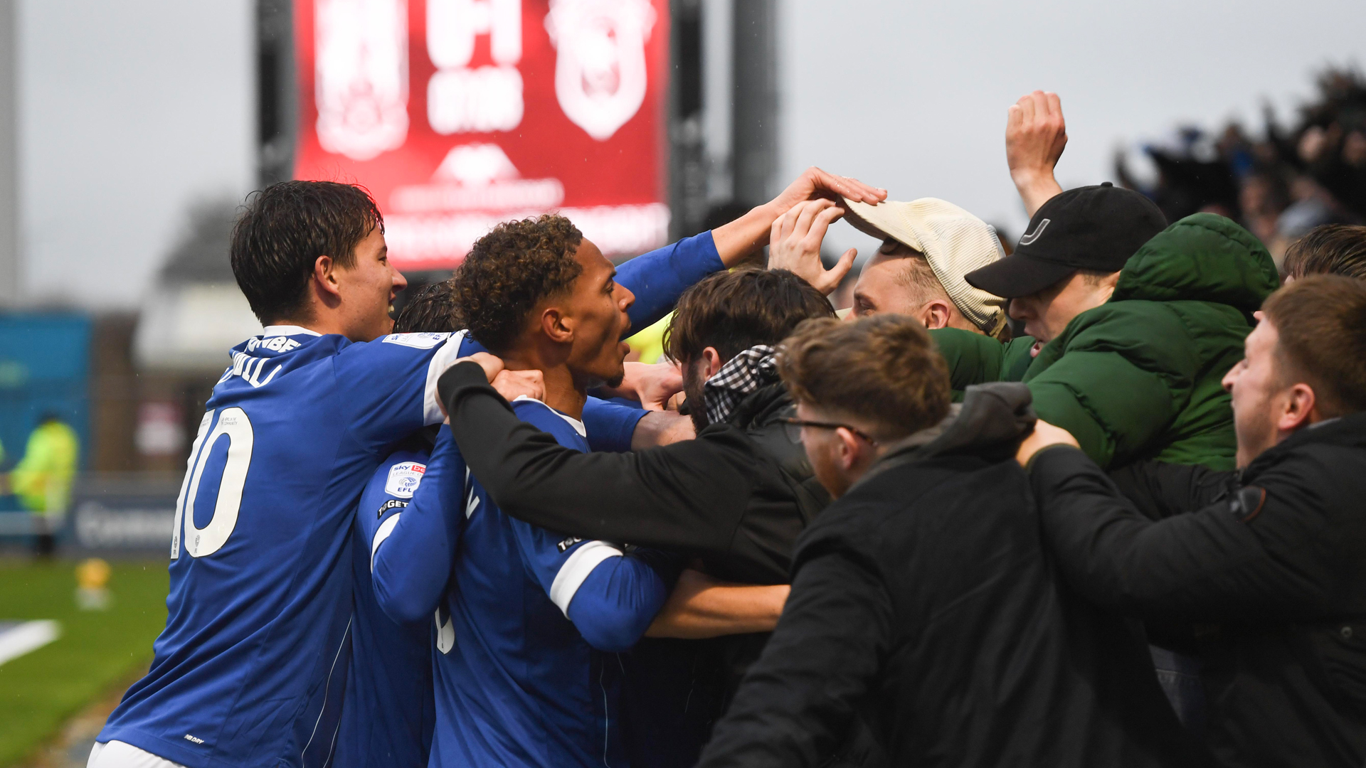 City celebrate scoring against Northampton Town