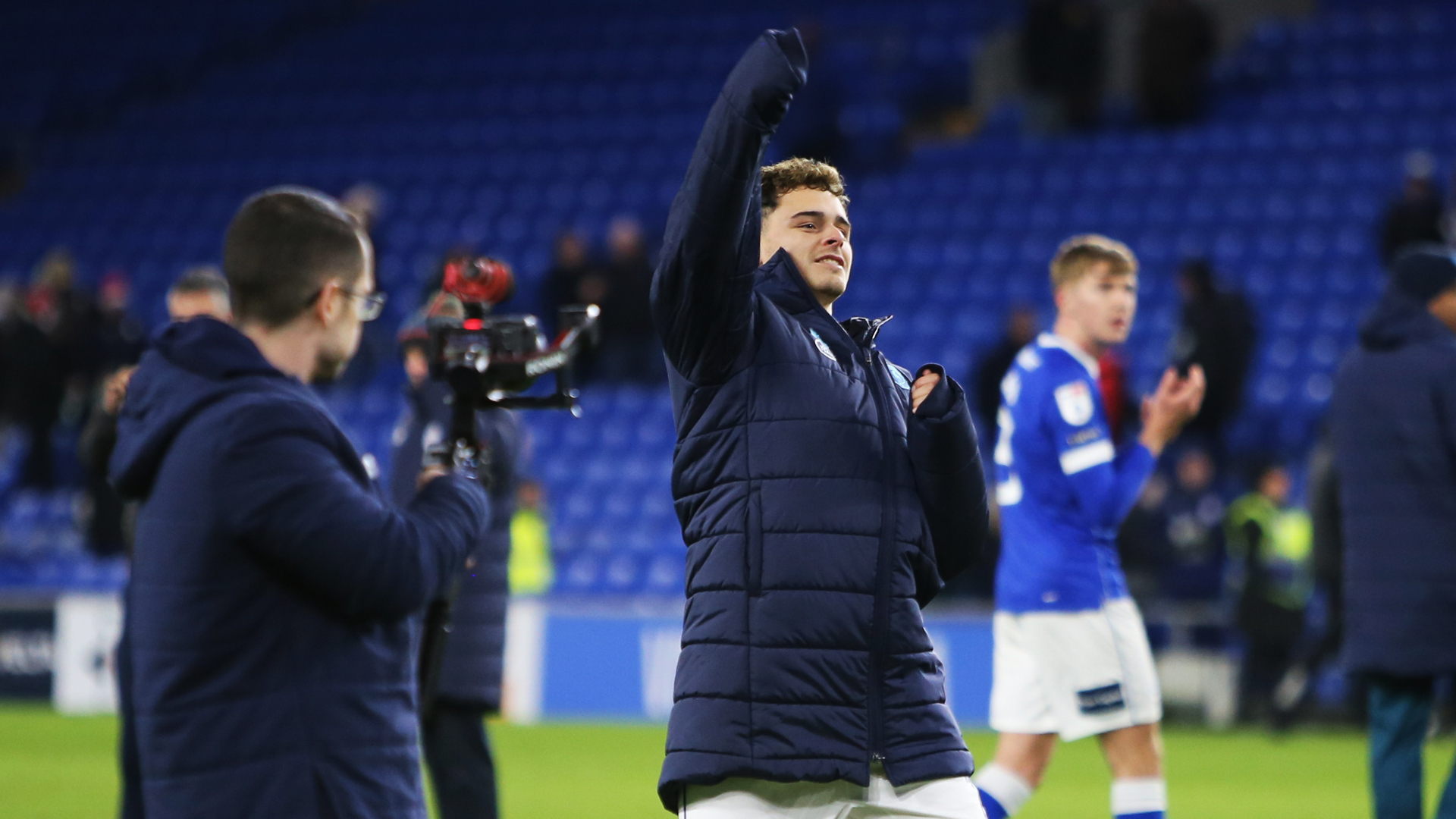 Alex Robertson celebrates at full-time against Exeter City.