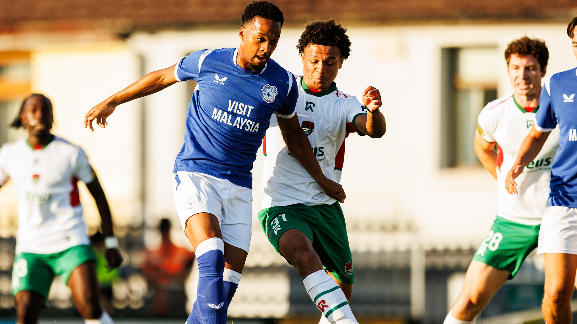 Chris Willock competes for the ball against Cork City...