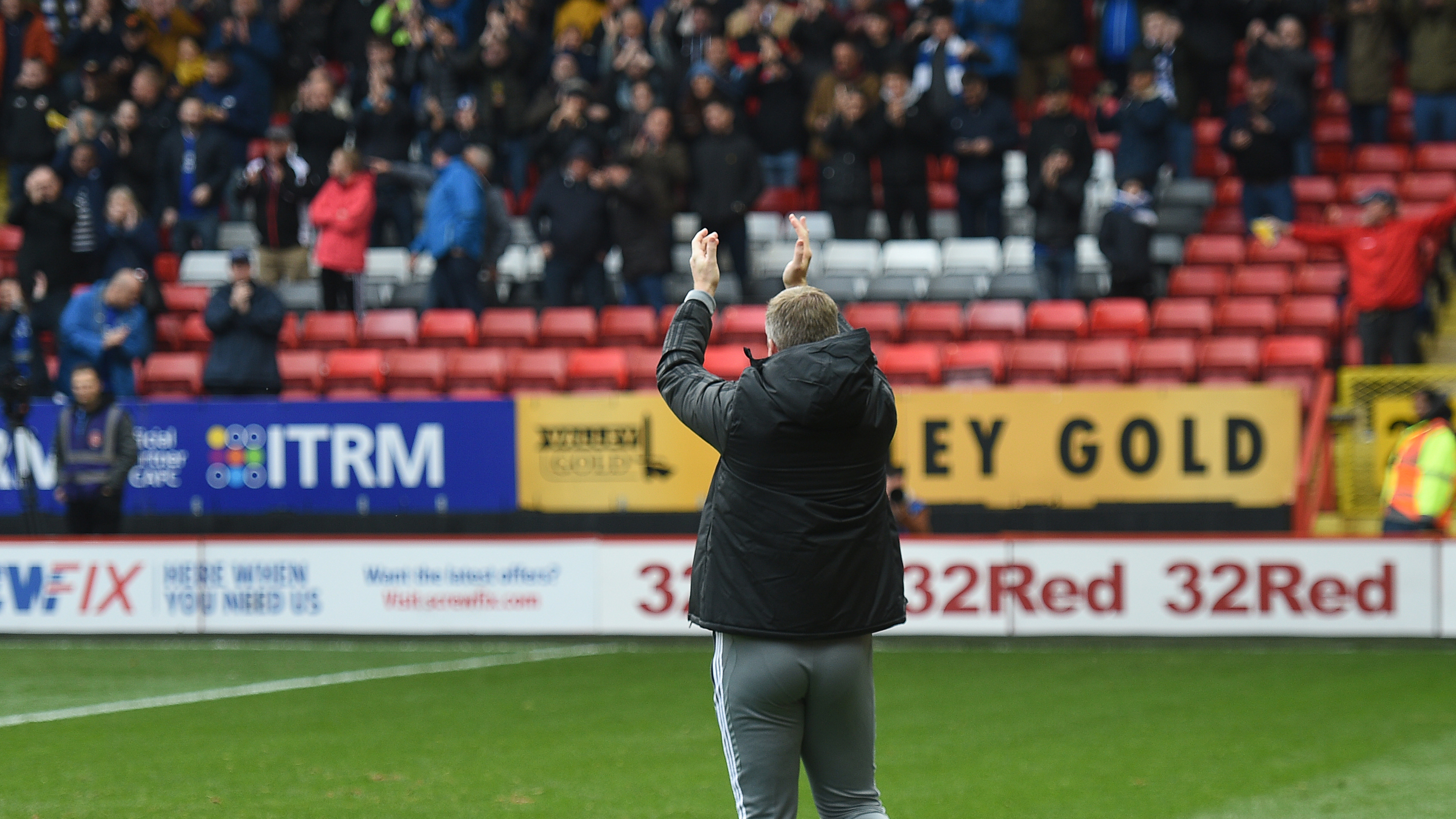 The Bluebirds boss applauds the away support at Charlton...