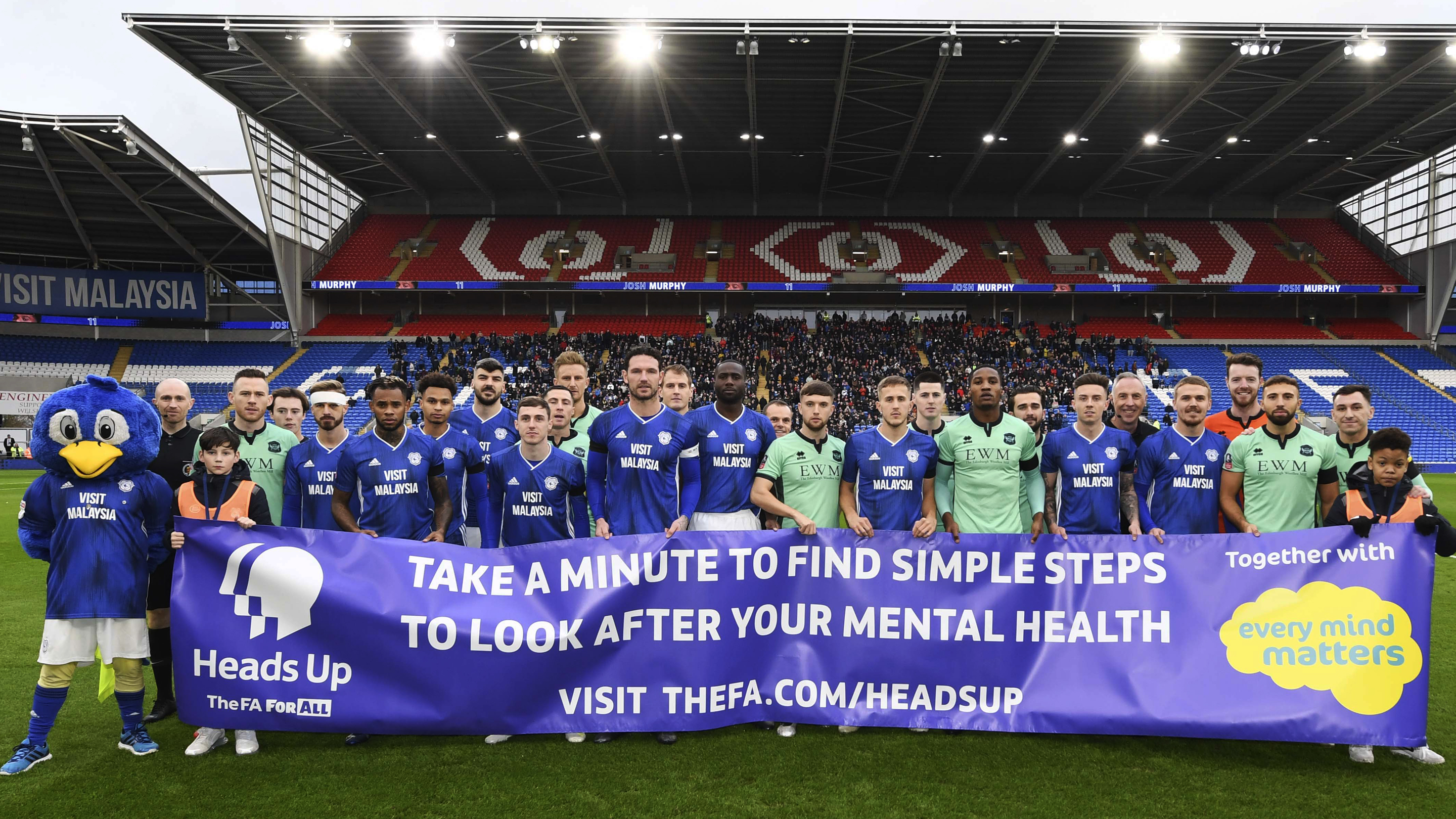 The Bluebirds and Carlisle United show their support for the FA's Heads Up campaign...