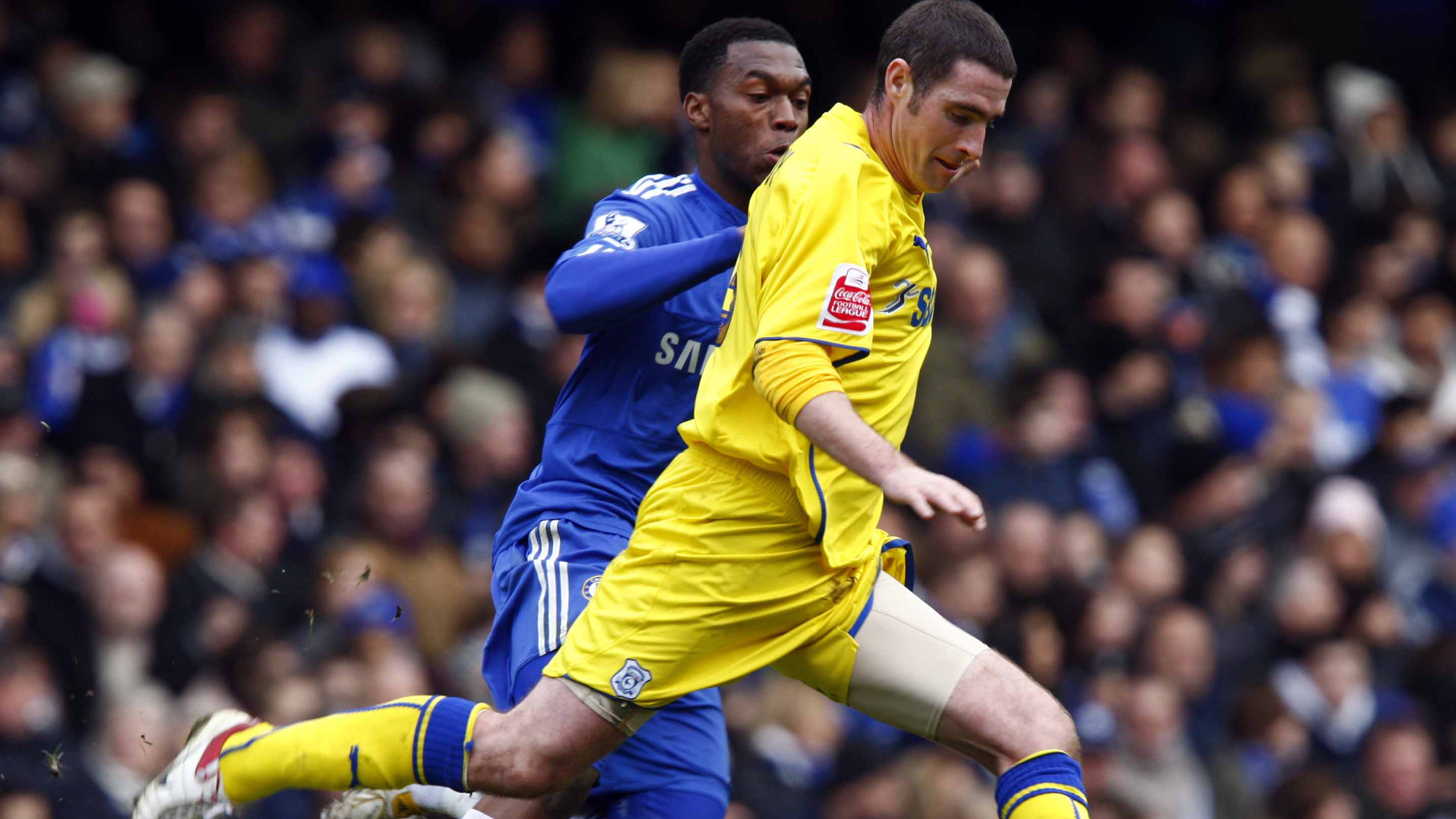 Mark Kennedy battles a young Daniel Sturridge...