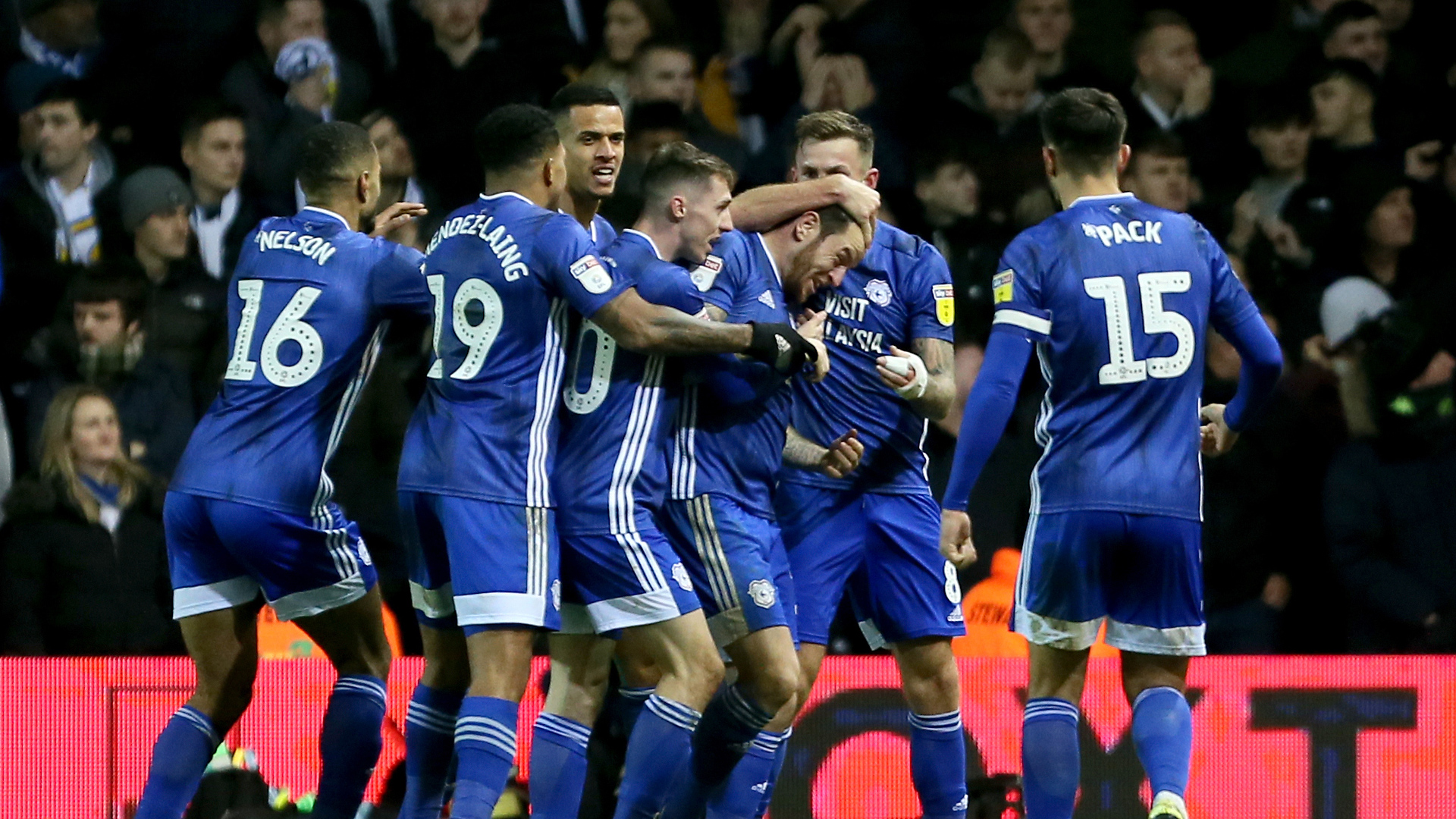 The team thank Tomlin after his back heel flick...