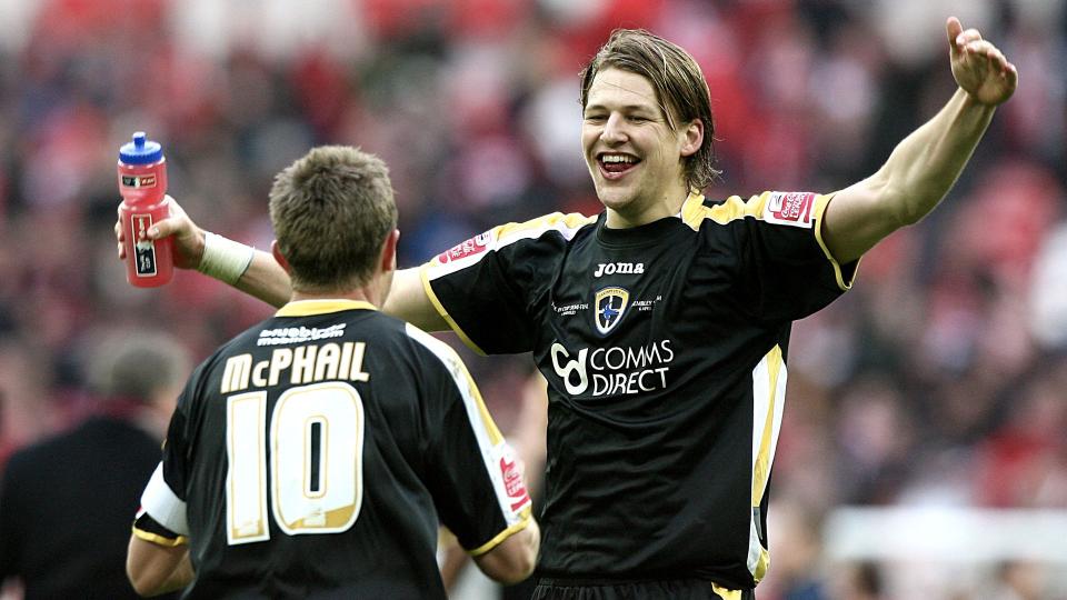 Glenn Loovens, former City defender, celebrates with Stephen McPhail...