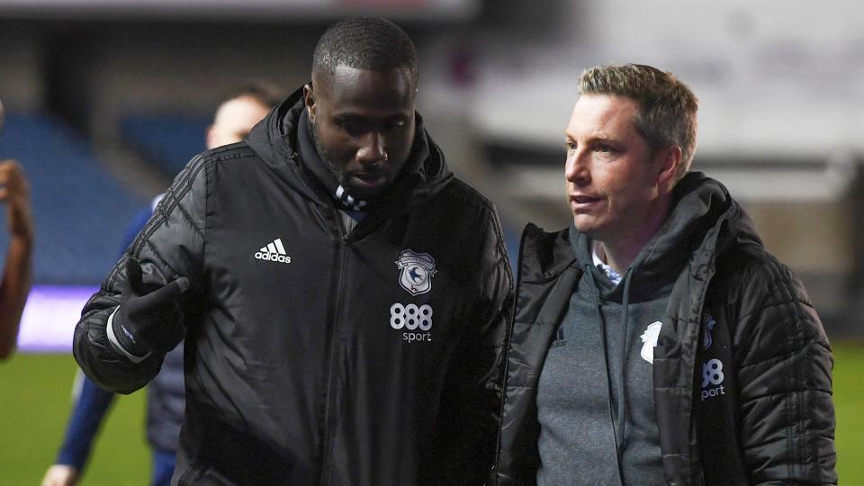 Neil Harris talks with Sol Bamba at The Den...