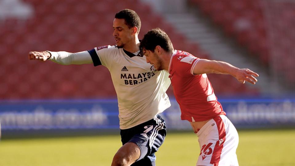 Robert Glatzel battles at the City Ground...