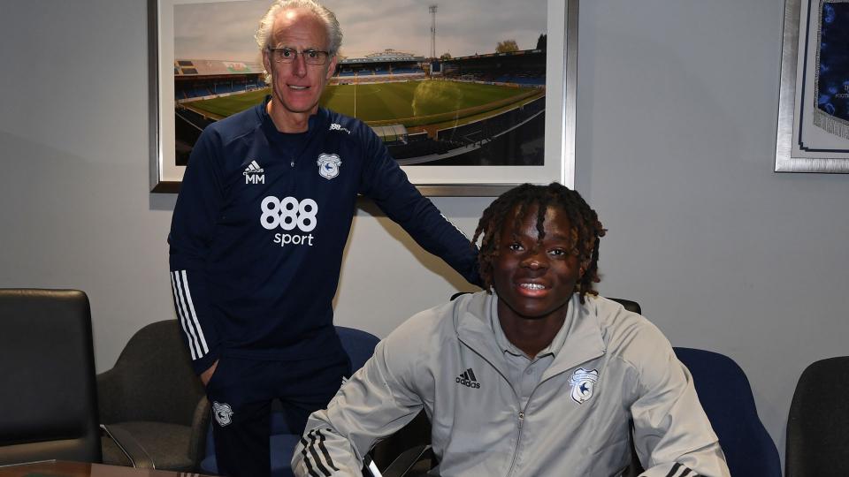 Ibrahim Bakare with City boss Mick McCarthy...