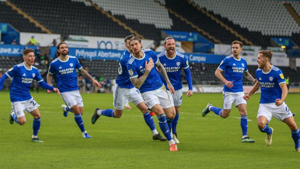 Flint celebrates his winner at Swansea...