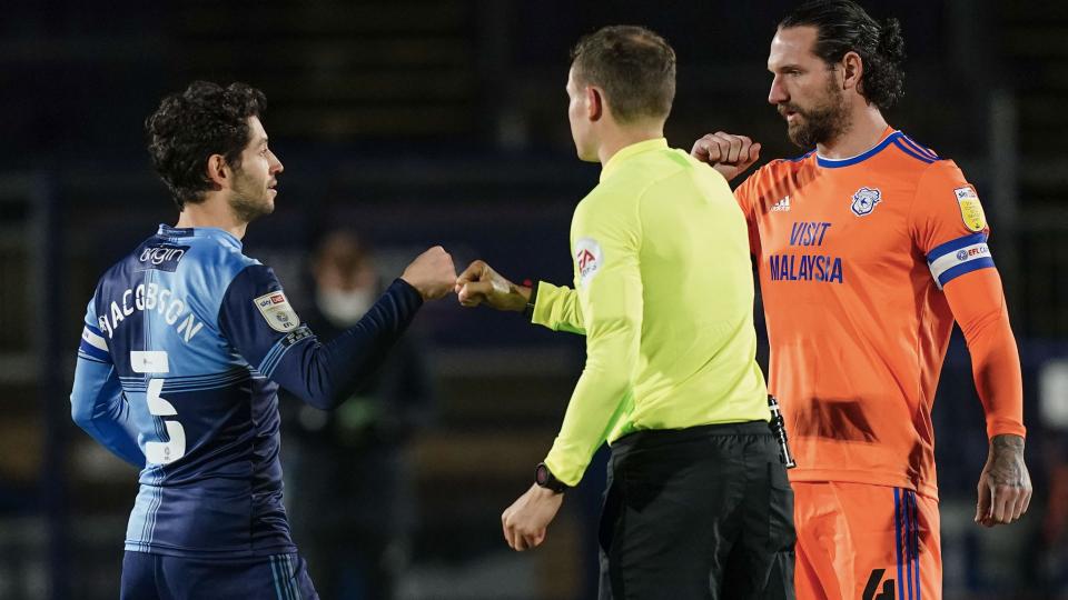 Joe Jacobson with City captain Sean Morrison...