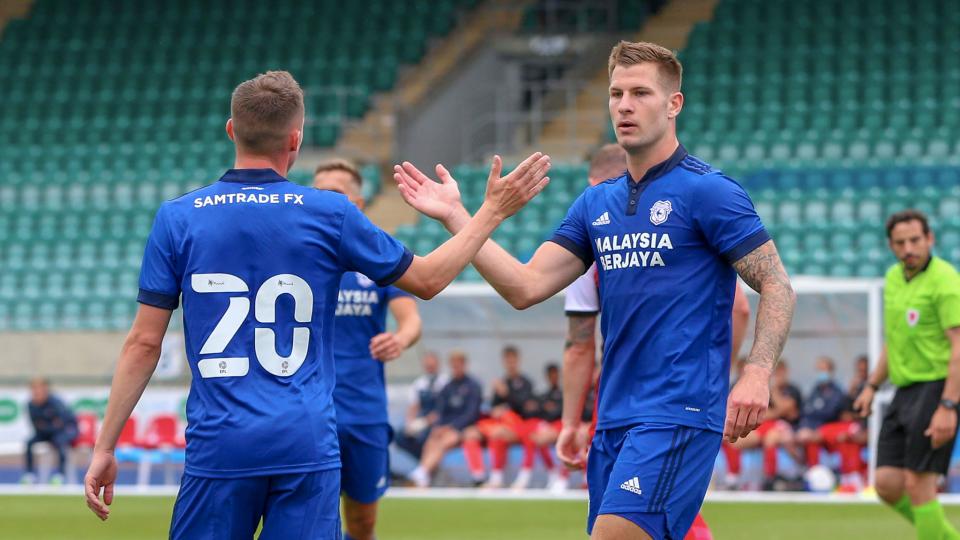 James Collins and Gavin Whyte celebrate against Exeter...