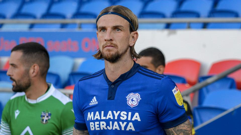 Aden Flint enters the field against Sutton United...