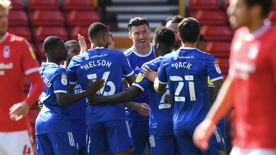 Moore celebrates his goals against Forest...