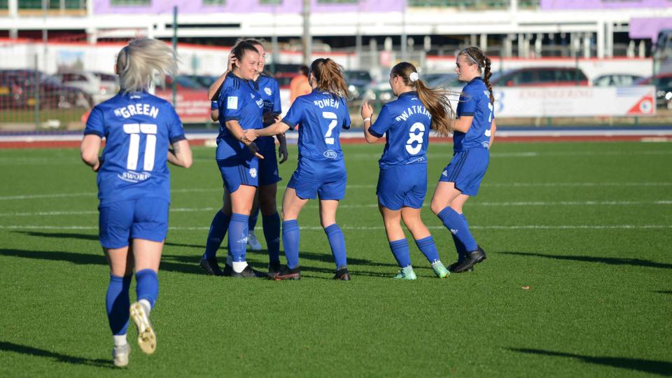 The Bluebirds celebrate at Cardiff International Sports Campus...