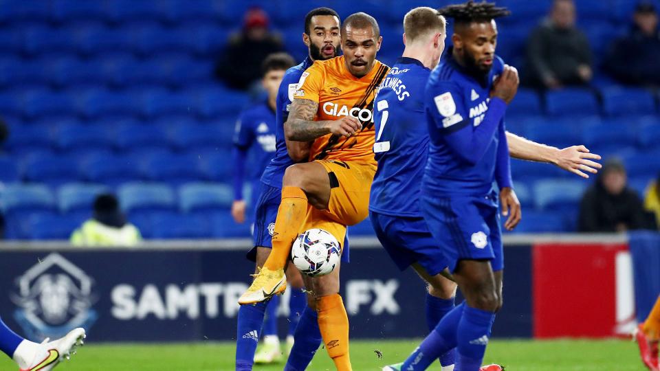 Magennis playing against Cardiff City in 2021...