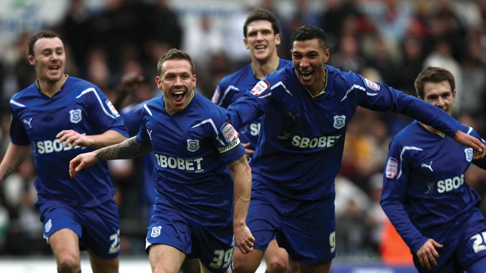 Craig Bellamy celebrates his winner against Swansea City...