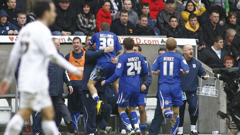 Craig Bellamy celebrates his winner against Swansea City...