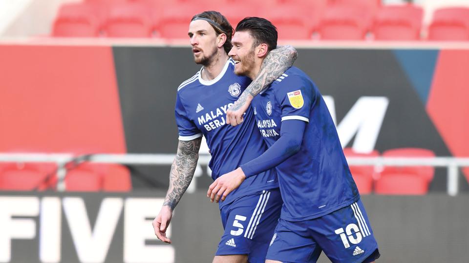 Aden Flint and Kieffer Moore celebrate at Ashton Gate...