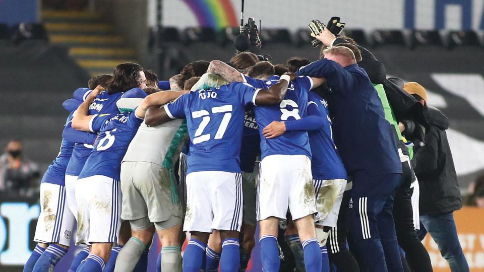 The Bluebirds celebrate their win in Swansea...
