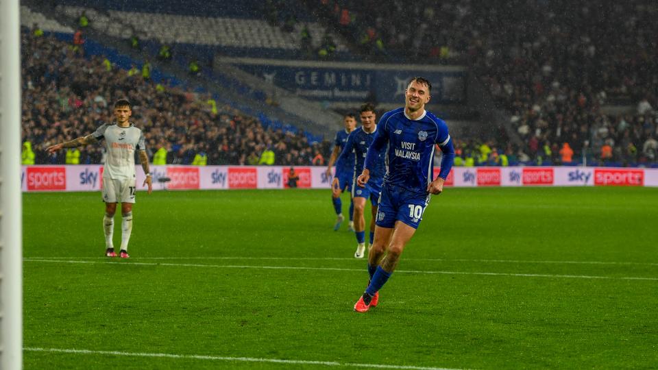 Aaron Ramsey celebrates his goal against Swansea City...