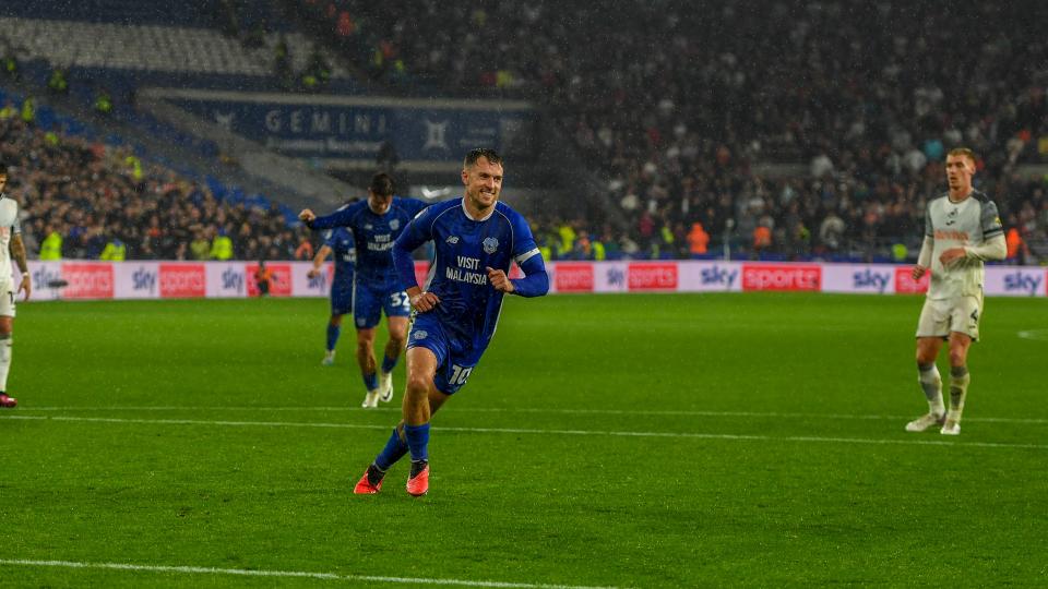 Aaron Ramsey celebrates his goal against Swansea City...