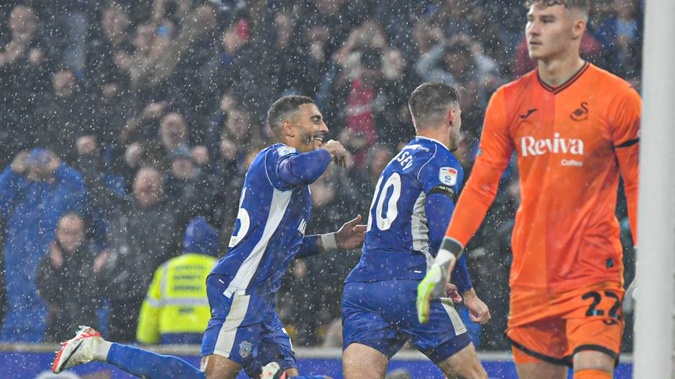 Aaron Ramsey and Karlan Grant celebrate...