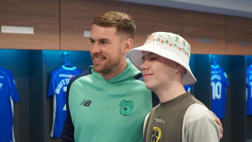 Aaron Ramsey interacts with Cardiff City fans