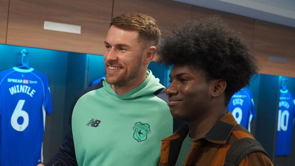 Aaron Ramsey interacts with Cardiff City fans