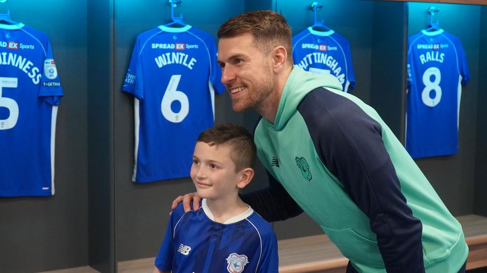 Aaron Ramsey interacts with Cardiff City fans