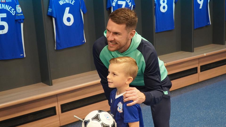 Aaron Ramsey interacts with Cardiff City fans